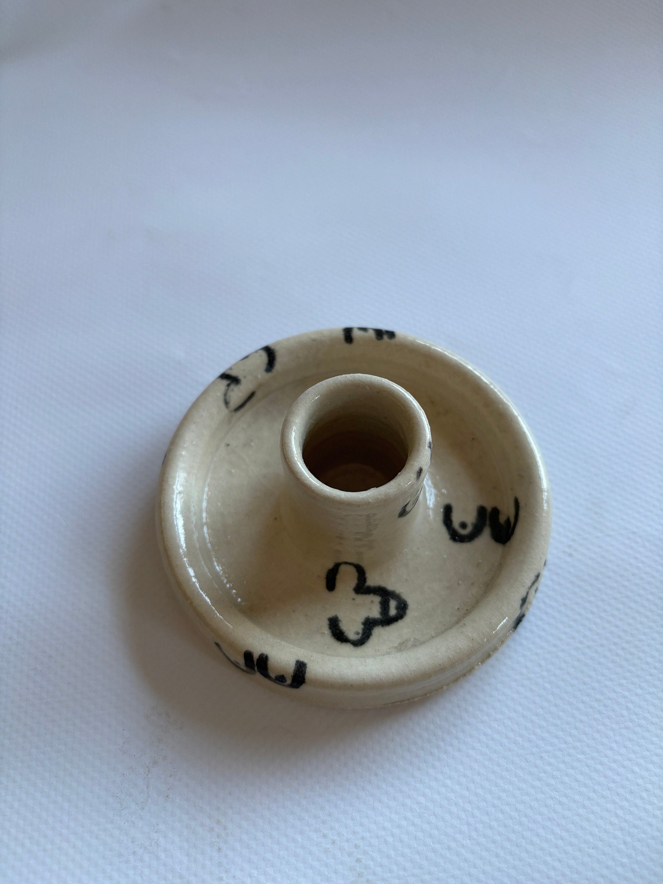 Penis and boobs candlestick holder